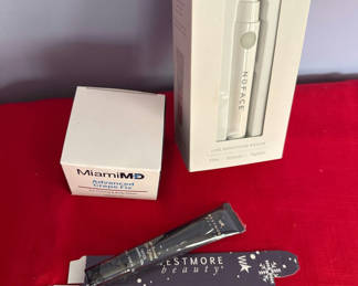 Lot 79: NuFACE FIX facial device with skincare items