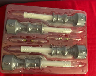 Lot 96: Four gray and white light socket components with bulbs
