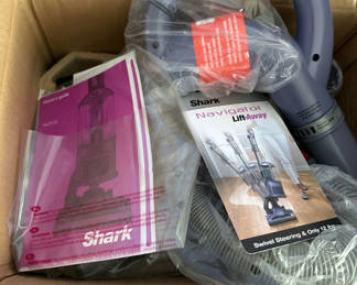 Lot 29: Shark Navigator Lift-Away vacuum with accessories