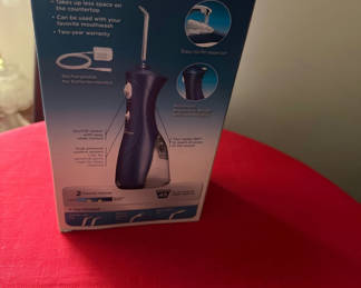 Lot 154: Waterpik Water Flosser Cordless Plus Box