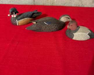 Lot 189: Three hand-painted wooden duck decoys