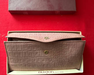 Lot 152: Pink crocodile-embossed Buxton wallet in box