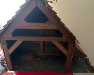 Lot 160: Wooden light up creche’ with straw nesting material