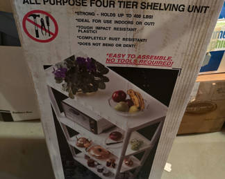 Lot 181: Perm A Shelf four-tier shelving unit