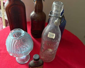 Lot 159: Collection of vintage glass bottles and blue etched glass ornament
