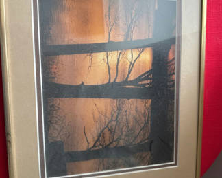 Lot 143: Framed landscape art with silhouetted trees and fence