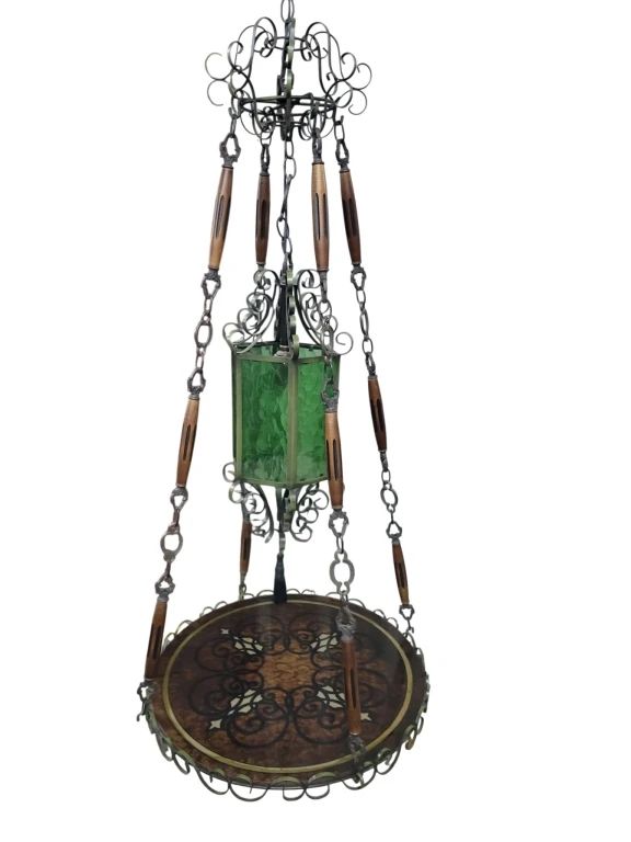 1 - RARE Mid-Century Spanish Swag Lamp Table (Description): Very hard to find Spanish Revival hanging swag lamp with green glass central hexagonal lantern and supporting hanging decorative marble circular table, all adorned with iron scrollwork. Height 60" or more with chain, 24" diameter table. Used as is electric/electronic/mechanical item. No guarantee all components present, untested.