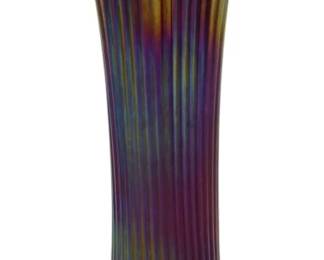 663 - Northwood Amethyst Fine Rib Carnival Vase (Description): Vintage Northwood amethyst Fine Rib carnival  glass vase featuring the classic ribbed  pattern with iridescent finish. Measures 10.5  inches tall.