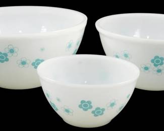 1185 - Pyrex Promotional Bazaar 3pc Bowl Set (Description): Vintage Pyrex hard-to-find Promotional Bazaar  three-piece mixing bowl set. The white milk  glass bowls feature a charming turquoise  floral pattern with stylized daisy motifs.  The nesting set includes three graduated sizes. Measures 4 inches by 8 inches.