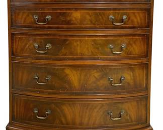 7743 - Flame Mahogany Bow Front 5 Drawer Chest (Description): A handsome bow front chest of drawers crafted  in flame mahogany with decorative banding on  each drawer front. This five-drawer chest  features a serpentine curved facade with  beautiful figured mahogany veneers displaying classic flame patterns. The piece is fitted  with brass bail pull hardware throughout and  rests on bracket feet. The traditional  Georgian-inspired styling and rich wood tones  make this an elegant storage piece. Measures