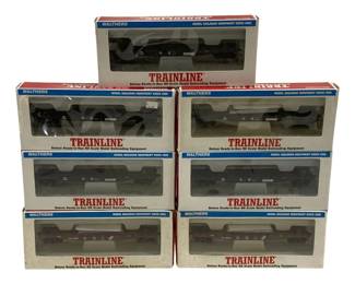 1621 - 9pc Walthers Trainline HO Scale Train Cars (Description): Collection of nine Walthers Trainline HO  scale model railroad cars in original boxes.  The set includes various freight cars  including flatcars and other rolling stock.  Walthers has been producing model railroad equipment since 1932. These are deluxe  ready-to-run HO scale models.