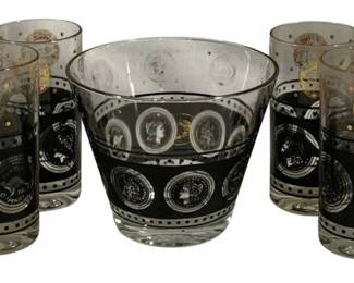 1547 - 6pc Horses Glassware Set w/ Die Bowl 5.5in (Description): Six-piece vintage glassware set featuring a  coin pattern design. The set includes  drinking glasses and a coordinating ice bowl,  all decorated with black and gold coin  motifs depicting various currency designs. The glasses measure 5.5" tall. Mid-century  modern bar ware set in excellent decorative  condition.