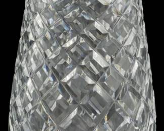 1238 - Waterford Crystal Killeen Pattern Vase 7.5" (Description): Waterford Crystal vase in the Killeen  pattern, featuring a distinctive diamond  crosshatch cut design across the body with  vertical fluting at the rim and horizontal  cuts near the base. The vase has a tapered form, narrowing at the bottom and widening  toward the flared rim. Measures 7.5 inches  tall.
