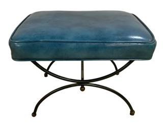 7600 - Mid Century Blue Stool on Iron Base (Description): Mid century footstool featuring a cushioned  seat atop a black wrought iron curule-style  base with ball feet. Measures 14 inches wide  by 20 inches long by 15 inches tall.