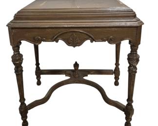 1418 - Vintage Carved Wooden Table (Description): Carved wooden table featuring decorative  carved details on the apron and turned legs  with stretcher base. The piece shows normal  wear and has losses to stain. Measures 31  inches by 29 inches by 20 inches.