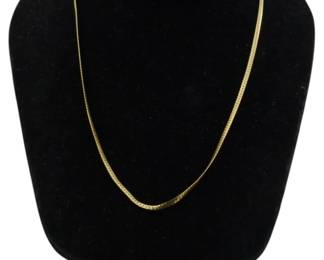 829 - 12Kt Gold Filled Herringbone Chain Necklace (Description): 12Kt gold filled necklace featuring a flat  herringbone chain design with a subtle woven  texture. The chain has a warm golden tone and  elegant drape. Weight: 0.22oz.