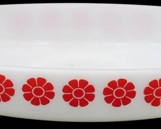 1160 - Federal Red Daisy Casserole 2"x11"x7" (Description): Federal red daisy casserole dish in white  milk glass featuring a charming mid-century  modern design. The oval baking dish is  decorated with a repeating pattern of bold  red daisy flowers around the exterior. Measures 2 inches tall by 11 inches long by 7  inches wide.