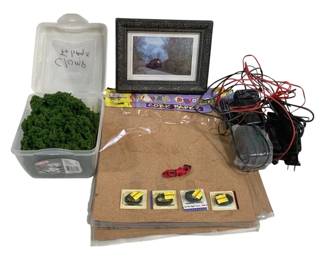 1684 - Lot Assorted Items Train Memorabilia & Craft (Description): Lot of assorted items including model train  hobby supplies and memorabilia. Features a  small framed photograph of a steam  locomotive, container of green lichen or moss  for model scenery, cork paper sheets, model train magnets or patches, various wiring and  power supplies for model train layouts, and  additional crafting materials. Ideal for  model railroad enthusiasts.