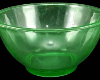 899 - Vtg Uranium Depression Glass Bowl (Description): Vintage uranium depression glass bowl in a  translucent green color with a classic  rounded form and rolled rim. The glass  exhibits the characteristic green hue  associated with uranium glass from the Depression era. Measures 4 1/2" x 9".