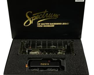 1581 - Bachmann Spectrum DCC HO USRA Locomotive (Description): Bachmann Spectrum Master Railroader Series  DCC On Board HO scale USRA locomotive and  tender car. The locomotive is numbered 5224  and features a black finish with gold  lettering. Comes in original foam-lined presentation box with protective plastic  cover.