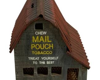 1714 - Mail Pouch Tobacco Barn Bank 7"x6.5"x4" (Description): Mail Pouch Tobacco barn bank featuring the  iconic advertising slogan "Chew Mail Pouch  Tobacco - Treat Yourself To The Best." This  decorative bank is crafted in the style of a  rustic American barn with a corrugated tin-style roof in weathered red and gray  painted wooden siding. The bank features  mesh-covered windows and a coin slot opening.  Measures 7" x 6.5" x 4".