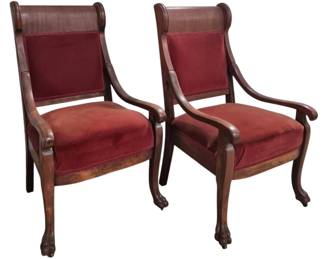 1404 - Pair Empire Arm Chairs 41"x23"x24" (Description): Pair of Empire arm chairs featuring elegant  curved arms and scrolled crest rails. The  chairs are upholstered in a rich burgundy  velvet fabric on both the seats and backs.  They stand on carved paw feet. Each chair measures 41 inches high by 23 inches wide by  24 inches deep.
