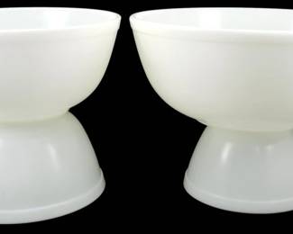 1129 - Pyrex Milk Glass Opal 4pc Bowl Set 4"x10" (Description): Pyrex milk glass opal four-piece bowl set  featuring classic white opaque glass  construction. The set includes mixing bowls  that can be stacked or nested for convenient  storage. Each bowl displays the characteristic smooth, glossy finish of Pyrex  milk glass. Measures 4 inches by 10 inches.
