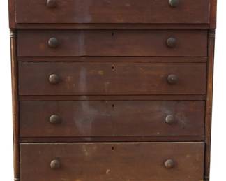 570 - Antique Five Drawer Chest 49"x43"x20" (Description): Antique five drawer chest of drawers in dark  wood finish. Features a rectangular top over  five graduated drawers, each fitted with  wooden knob pulls. The piece has flanking  turned columns on the front corners and rests on small turned feet. Shows age-appropriate  wear consistent with antique furniture.  Measures 49 inches high by 43 inches wide by  20 inches deep.