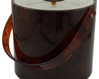 860 - Vintage Georges Briard Ice Bucket 7"x8" (Description): Vintage Georges Briard ice bucket featuring a  rich tortoiseshell-style brown finish with a  matching translucent amber handle. The lid  has a clear acrylic top with a coordinating  tortoiseshell knob finial. A sophisticated Mid-Century Modern barware piece. Measures 7  inches in diameter by 8 inches tall.