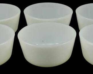 1016 - 6 Vtg Fire King Milk Glass Bowls 2"x4" (Description): Set of six vintage Fire King milk glass bowls  in classic white. Each bowl measures 2  inches tall by 4 inches in diameter. The  bowls feature the characteristic smooth,  opaque white milk glass that Fire King is known for, with simple straight sides and  flat bottoms. Perfect for custards, desserts,  or small servings.