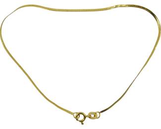 824 - 14Kt Italian Gold Herringbone Bracelet (Description): 14Kt Italian gold bracelet featuring a  delicate herringbone chain design with a  spring ring clasp. This elegant piece  showcases the classic flat, woven pattern  characteristic of herringbone chains. Weight: 0.02oz.