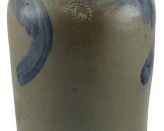 595 - 19th C Half Gallon Stoneware Crock Parr Family (Description): A 19th century half-gallon stoneware crock  attributed to the Parr Family. The crock  features a traditional cylindrical form with  a rolled rim and decorative cobalt blue  brushwork. Measures 11.5 inches in height.