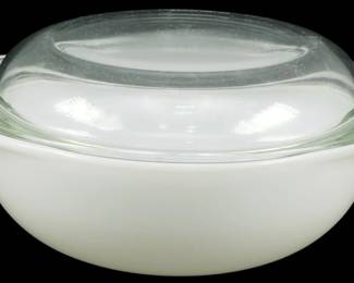 1103 - Vintage Pyrex Casserole w/ Lid 4.5"x7"x9" (Description): Vintage Pyrex casserole dish with matching  clear glass lid. The dish features the  classic white milk glass body with integrated  side handles and a domed lid. Measures 4.5  inches high by 7 inches wide by 9 inches long.