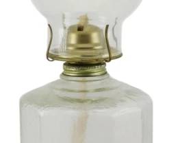 1006 - Home Sweet Home Glass Oil Lamp 18" (Description): Home Sweet Home pattern pressed glass oil  lamp featuring a clear glass chimney with  etched decorative band, brass burner collar,  and octagonal font. The base displays an  ornate embossed floral and scroll design typical of Victorian-era oil lamps. Measures  18 inches tall.