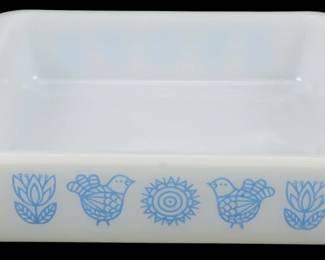 1214 - Glassbake Bird & Flower Square Baking Dish (Description): Glassbake square baking dish featuring a  charming blue on white milk glass design with  alternating birds, flowers, and sunburst  motifs in a folk art Pennsylvania Dutch  style. Measures 2 1/2 inches tall by 10 inches by 9 inches.