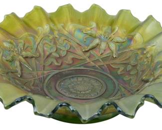 690 - Northwood Wishbone & Orchid Carnival Bowl (Description): Vintage Northwood emerald green Wishbone &  Orchid pattern carnival glass bowl. This  striking piece features an iridescent finish  with characteristic carnival glass luster,  displaying rich green tones that shift to purple and gold highlights. The bowl  showcases the classic Wishbone pattern with  intertwining orchid motifs radiating from a  central medallion design. The ruffled,  crimped edge adds elegant dimension to the
