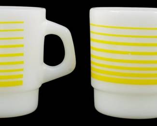 1098 - Pr Thermocrisa Yellow Stripe Milk Glass Mugs (Description): Set of two vintage Thermocrisa milk glass  mugs featuring yellow horizontal stripes.  These stackable mugs have the classic  D-handle design typical of mid-century  American kitchenware. Each mug measures 3.5 inches tall.