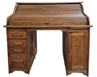 1410 - Oak S Roll Top Desk 44"x50"x30" (Description): Oak S roll top desk featuring a curved  tambour roll top that opens to reveal  multiple interior compartments and cubbies  for organization. The desk includes a bank of  drawers on the left pedestal, pull out writing surface and a cabinet door on the  right pedestal. Measures 44 inches high by 50  inches wide by 30 inches deep.