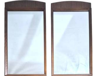 1408 - Pair Lane MCM First Edition Hanging Mirrors (Description): Pair of Lane mid-century modern hanging  mirrors featuring wooden frames with arched  tops and textured detailing. Each mirror  measures 55 inches tall by 20 inches wide.