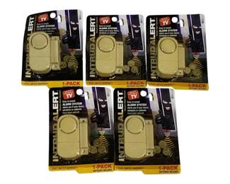 1041 - 5pc Lot Intrud Alert Alarms (Description): A lot of five Intrud Alert alarm systems.  Each alarm is new in original packaging and  designed for easy installation on doors,  windows, or cabinets. Batteries included with  each unit.