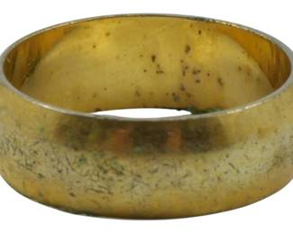 822 - 14Kt Gold Electroplated Ring, Size 7 0.13oz (Description): A 14Kt gold electroplated ring in size 7.  This classic band features a smooth, domed  profile with a polished finish. The ring  weighs 0.13oz and shows a warm golden tone  with natural surface wear consistent with age and use.