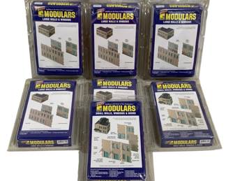 1679 - 7pc Lot Cornerstone HO Scale Modulars Kits (Description): Lot of seven Cornerstone HO Scale Modulars  model building kits. The collection includes  five Large Walls & Windows kits and two Small  Walls, Windows & Doors kits. All kits appear  to be factory sealed in original blister packaging. These modular components are  designed for building custom structures for  HO scale model railroad layouts.