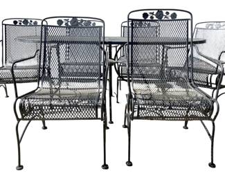 7696 - 7pc Patio Table & Chair Set (Description): Outdoor table and chair set with mesh  construction. The set features a rectangular  table and six matching armchairs, each  adorned with decorative rose motifs on the  backrests. The chairs feature curved arms and springy bases for comfortable seating. Table  measures 29" x 72" x 42", chairs measure 36"  x 27" x 26".