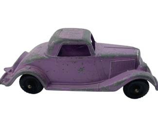 628 - Hubley Sedan Purple Car Metal 2"x5.5"x2.25" (Description): Hubley purple metal sedan toy car. Measures 2  inches by 5 1/2 inches by 2.25 inches.