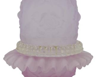 874 - Fenton Lavender Embossed Rose Satin Fairy (Description): Vintage Fenton fairy lamp in lavender satin  glass featuring an embossed rose pattern. The  three-piece lamp consists of a ruffled  crimped base with floral embossing and a dome  shade with matching rose motif. A clear glass beaded ring separates the base from the  shade. Measures 7 inches tall.