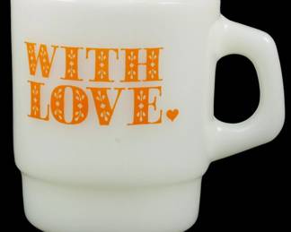1171 - Vtg Anchor Hocking "With Love" Mug 3.5" (Description): Vintage Anchor Hocking "With Love" mug in  white milk glass with orange typography and a  small heart accent. This classic Fire-King  style stackable mug features the phrase "With  Love." in decorative serif lettering. Measures 3.5 inches tall.