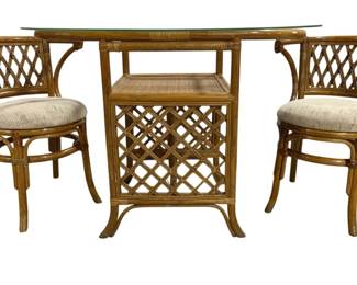 7680 - Bamboo Rattan Table & Chair Set Glass Top (Description): Bamboo and rattan three-piece dining set  featuring a demilune table with glass top and  lattice-work base with lower shelf,  accompanied by two matching chairs with  lattice backs and upholstered cream-colored seats. The set displays a warm honey-toned  finish throughout. Table measures 30"x42",  chairs measure 28"x20"x18".