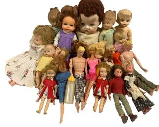 2016 - Group Lot of Baby & Barbie Dolls (Description): A varied collection of vintage baby dolls and  Barbie-style fashion dolls. The group  includes composition and hard plastic baby  dolls from various eras, some dressed in  period clothing and others undressed. Also included are several Barbie and Ken type  dolls, as well as smaller character dolls.  The dolls range in size from miniature to  approximately 12 inches tall, representing a  cross-section of mid-century doll