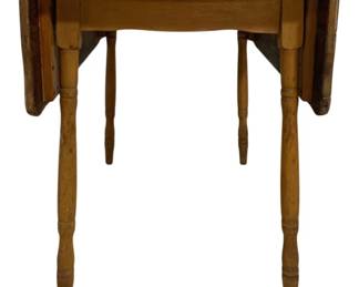 7714 - Vintage Pine Drop Leaf Table 30"x39"x34" (Description): Vintage pine drop leaf table featuring a  rustic plank top with two drop leaves and  turned legs. The table displays a warm  honey-toned patina consistent with age and  use. Measures 30 inches tall by 39 inches wide by 34 inches deep.
