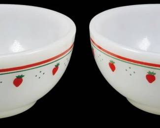 1130 - Vtg Termocrisa Pr Strawberry Bowls 2"x5" (Description): Vintage Termocrisa pair of strawberry bowls  in white milk glass. Each bowl features a  charming strawberry motif with red  strawberries and green accents around the  exterior, complemented by red and green banding near the rim. Measures 2 inches tall  by 5 inches in diameter.